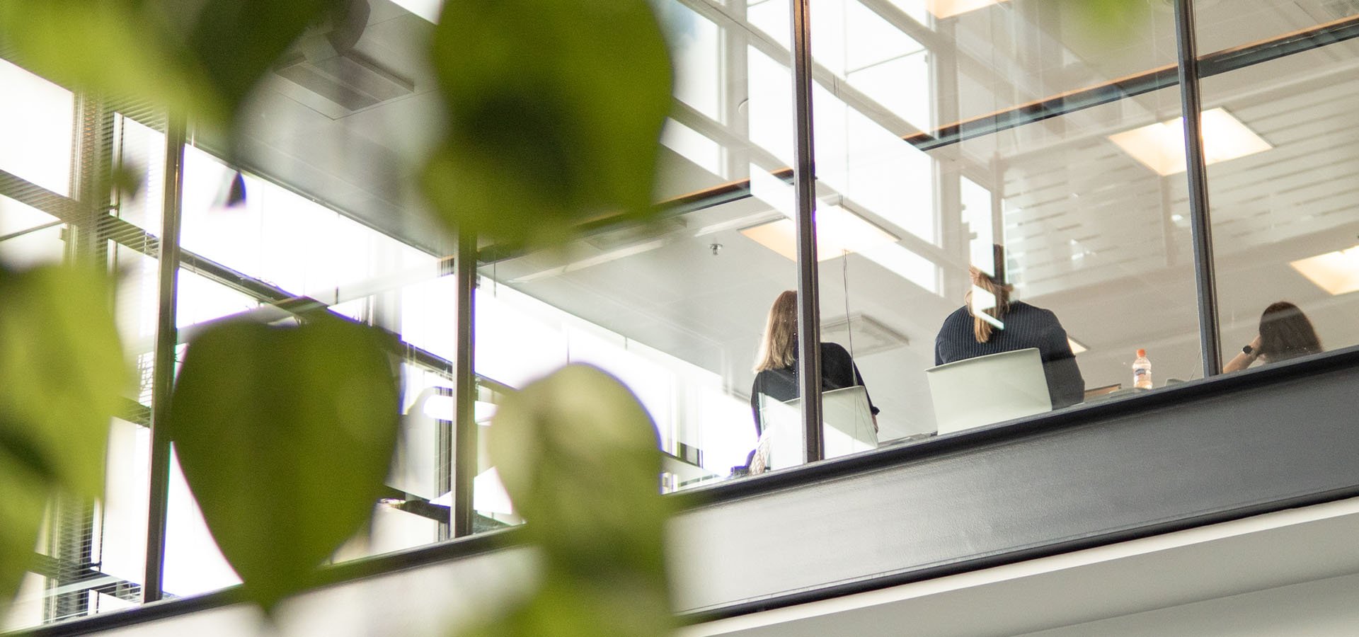 people sitting inside a conference room