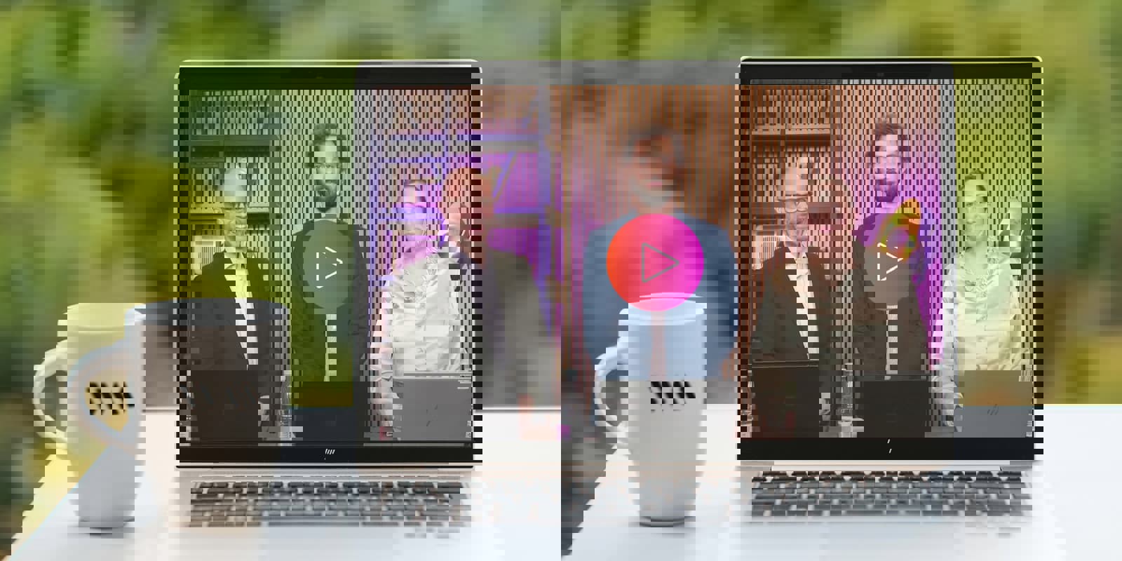 Laptop on a table with a coffee cup to the left