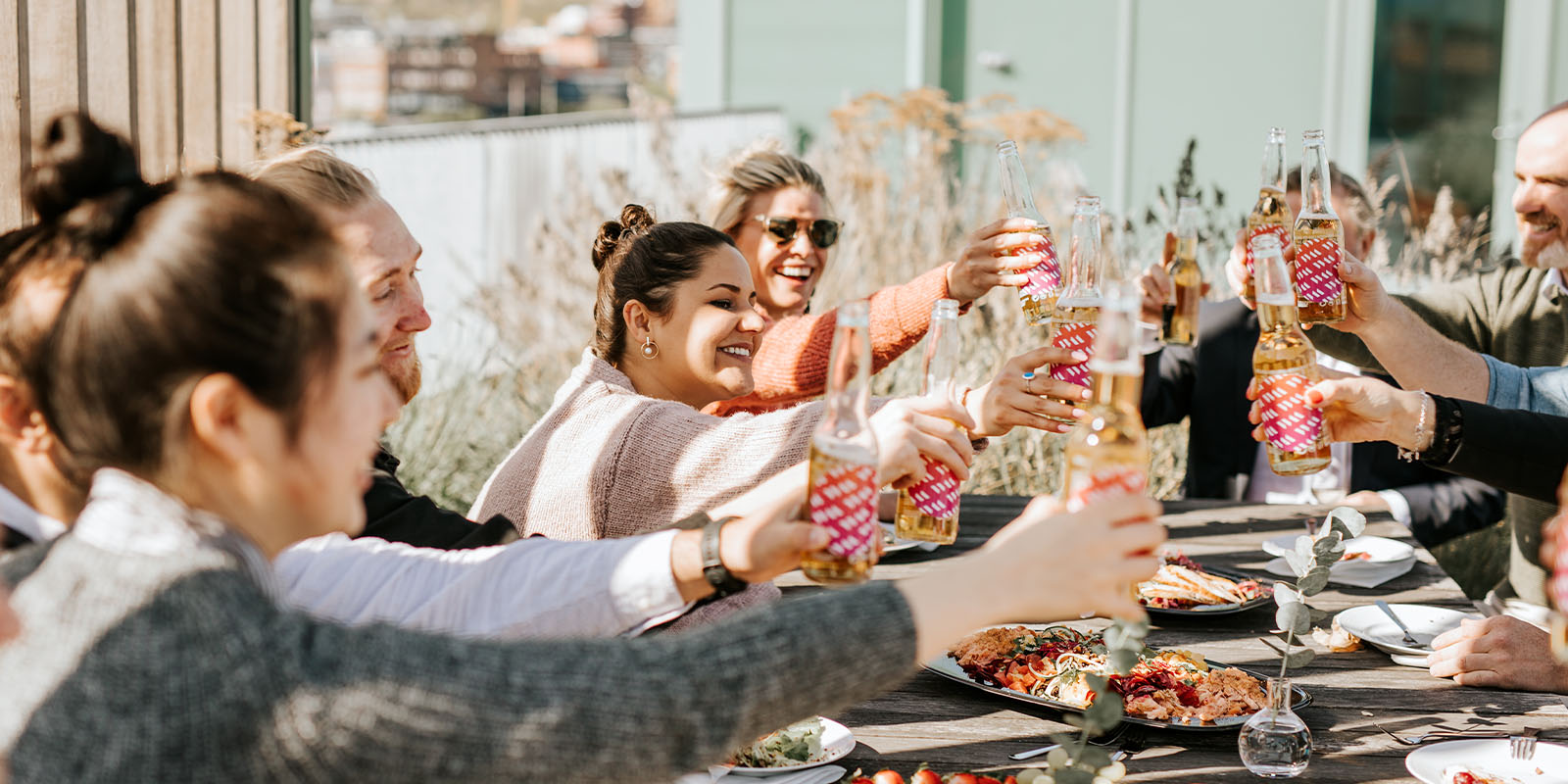 fellowmind careers and open vacancies_hero.jpg fellowmind people having fun outside at a dinner table